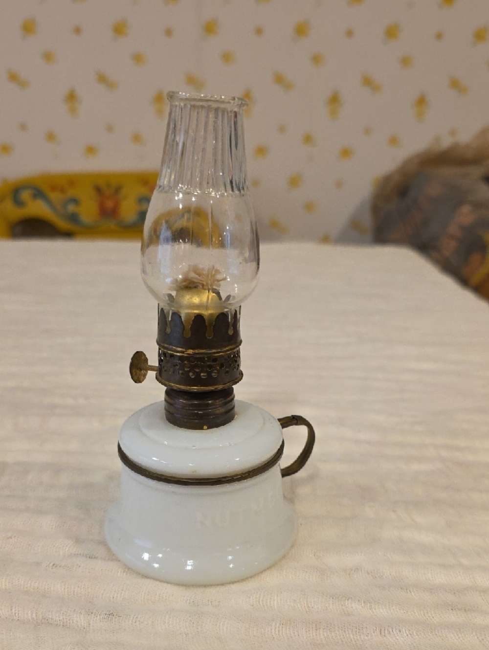 Antique white Nutmeg Oil Lamp with hurricanes.